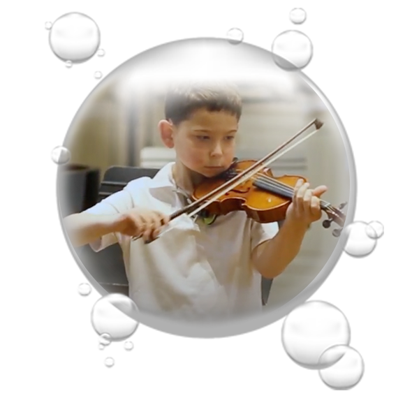 Young boy playing violin